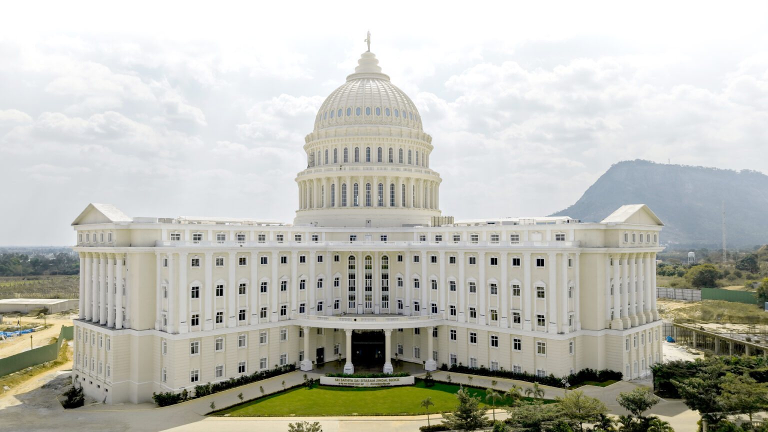 The SMSIMSR International Patient’s Block, a domed hospital building, at Sathya Sai Grama, Muddenahalli